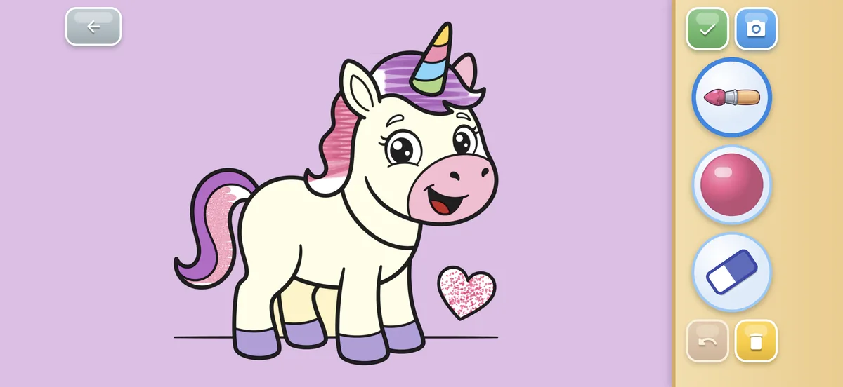 Painting a unicorn with a brush and glitter